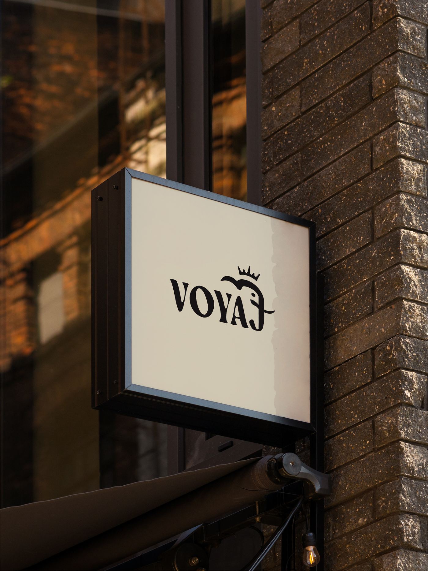 Voyaj storefront signage